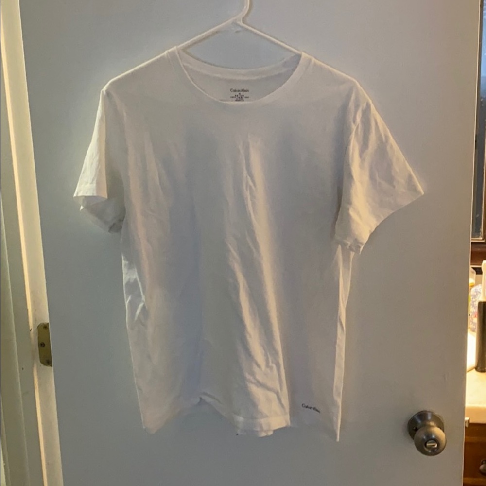 A white Calvin Klein Medium T-Shirt